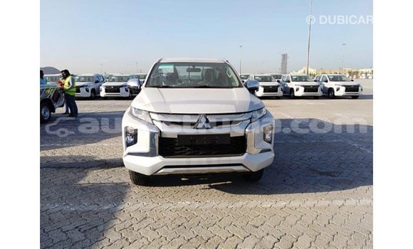 Buy Import Mitsubishi L200 White Car in Import - Dubai in Anse-la-Raye Buy Import Mitsubishi L200 White Car in Import - Dubai in Anse-la-Raye