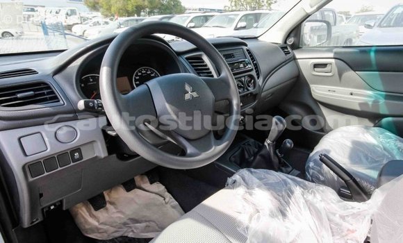 Buy Import Mitsubishi L200 White Car in Import - Dubai in Anse-la-Raye