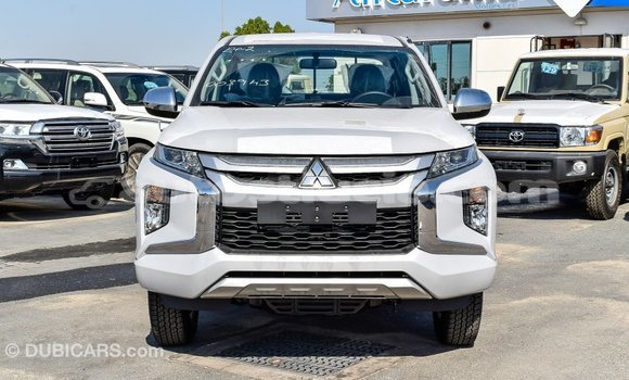 Buy Import Mitsubishi L200 White Car in Import - Dubai in Anse-la-Raye Buy Import Mitsubishi L200 White Car in Import - Dubai in Anse-la-Raye