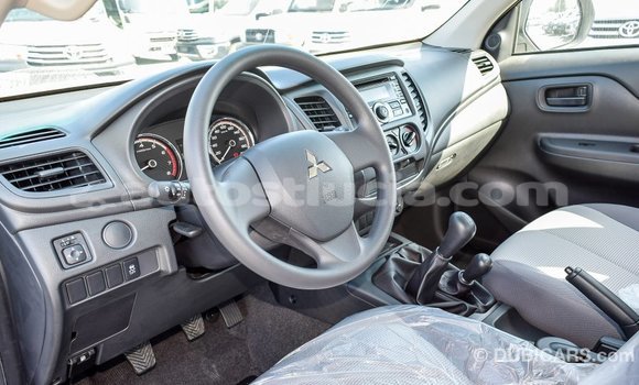 Buy Import Mitsubishi L200 White Car in Import - Dubai in Anse-la-Raye Buy Import Mitsubishi L200 White Car in Import - Dubai in Anse-la-Raye