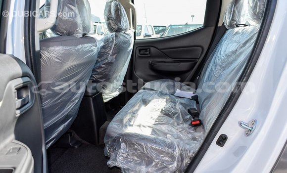 Buy Import Mitsubishi L200 White Car in Import - Dubai in Anse-la-Raye Buy Import Mitsubishi L200 White Car in Import - Dubai in Anse-la-Raye