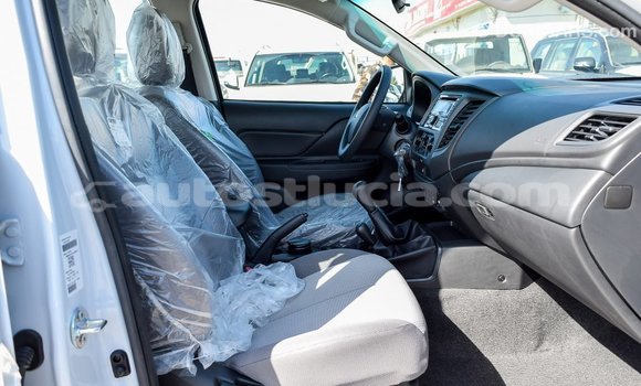 Buy Import Mitsubishi L200 White Car in Import - Dubai in Anse-la-Raye Buy Import Mitsubishi L200 White Car in Import - Dubai in Anse-la-Raye