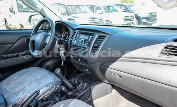 Buy Import Mitsubishi L200 White Car in Import - Dubai in Anse-la-Raye Buy Import Mitsubishi L200 White Car in Import - Dubai in Anse-la-Raye