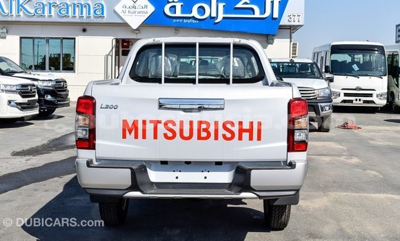 Buy Import Mitsubishi L200 White Car in Import - Dubai in Anse-la-Raye Buy Import Mitsubishi L200 White Car in Import - Dubai in Anse-la-Raye