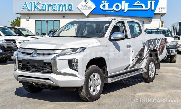 Buy Import Mitsubishi L200 White Car in Import - Dubai in Anse-la-Raye Buy Import Mitsubishi L200 White Car in Import - Dubai in Anse-la-Raye