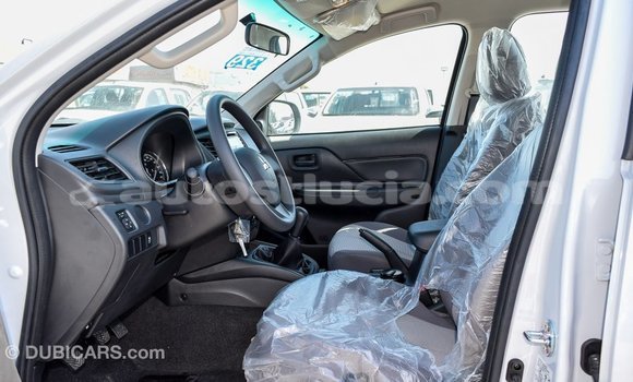 Buy Import Mitsubishi L200 White Car in Import - Dubai in Anse-la-Raye Buy Import Mitsubishi L200 White Car in Import - Dubai in Anse-la-Raye