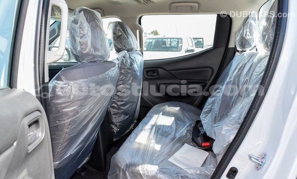 Buy Import Mitsubishi L200 White Car in Import - Dubai in Anse-la-Raye Buy Import Mitsubishi L200 White Car in Import - Dubai in Anse-la-Raye
