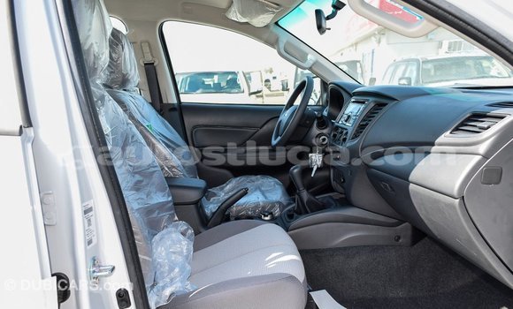 Buy Import Mitsubishi L200 White Car in Import - Dubai in Anse-la-Raye Buy Import Mitsubishi L200 White Car in Import - Dubai in Anse-la-Raye