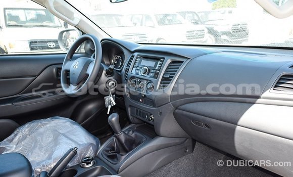 Buy Import Mitsubishi L200 White Car in Import - Dubai in Anse-la-Raye Buy Import Mitsubishi L200 White Car in Import - Dubai in Anse-la-Raye