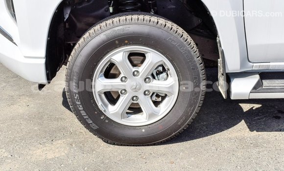 Buy Import Mitsubishi L200 White Car in Import - Dubai in Anse-la-Raye Buy Import Mitsubishi L200 White Car in Import - Dubai in Anse-la-Raye