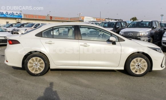 Buy Import Toyota Corolla White Car in Import - Dubai in Anse-la-Raye Buy Import Toyota Corolla White Car in Import - Dubai in Anse-la-Raye