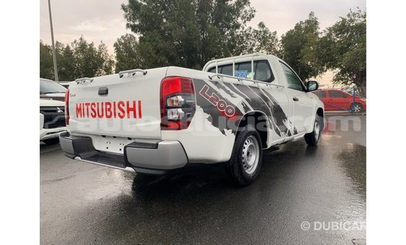 Buy Import Mitsubishi L200 White Car in Import - Dubai in Anse-la-Raye Buy Import Mitsubishi L200 White Car in Import - Dubai in Anse-la-Raye