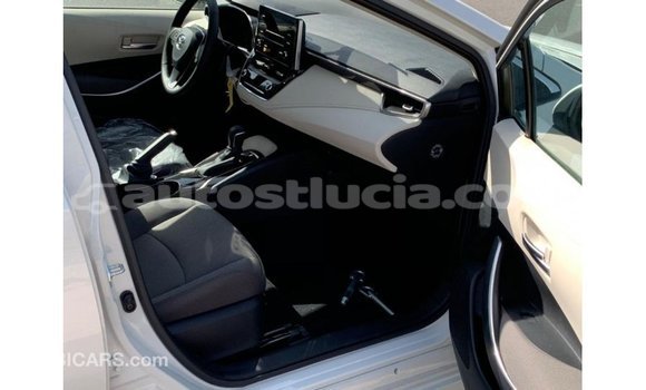 Acheter Import Voiture Toyota Corolla Blanc à Import - Dubai, Anse-la-Raye Acheter Import Voiture Toyota Corolla Blanc à Import - Dubai, Anse-la-Raye