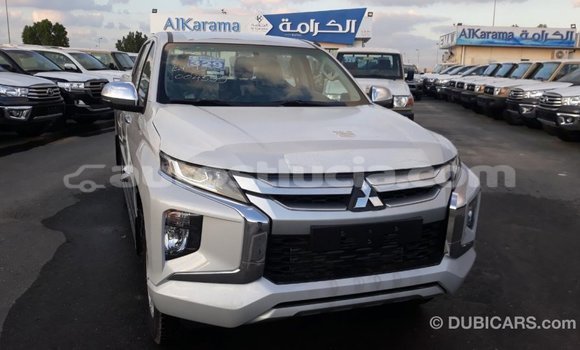Buy Import Mitsubishi L200 White Car in Import - Dubai in Anse-la-Raye Buy Import Mitsubishi L200 White Car in Import - Dubai in Anse-la-Raye