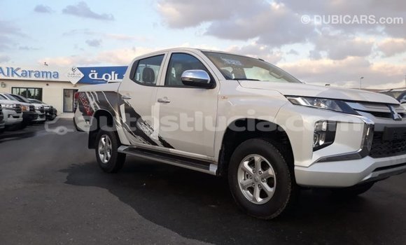 Buy Import Mitsubishi L200 White Car in Import - Dubai in Anse-la-Raye Buy Import Mitsubishi L200 White Car in Import - Dubai in Anse-la-Raye