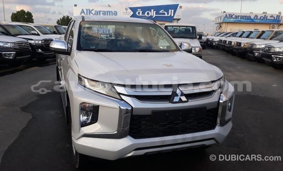 Buy Import Mitsubishi L200 White Car in Import - Dubai in Anse-la-Raye Buy Import Mitsubishi L200 White Car in Import - Dubai in Anse-la-Raye