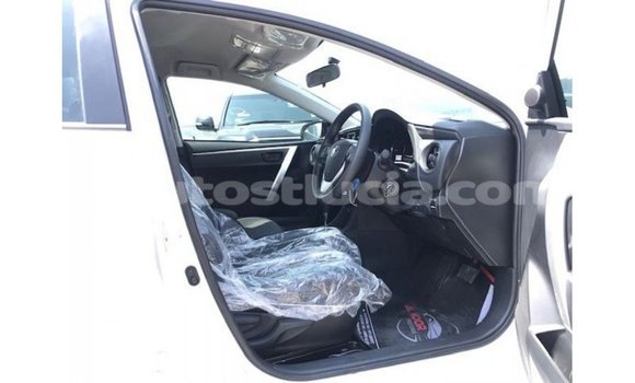 Buy Import Toyota Corolla White Car in Import - Dubai in Anse-la-Raye Buy Import Toyota Corolla White Car in Import - Dubai in Anse-la-Raye