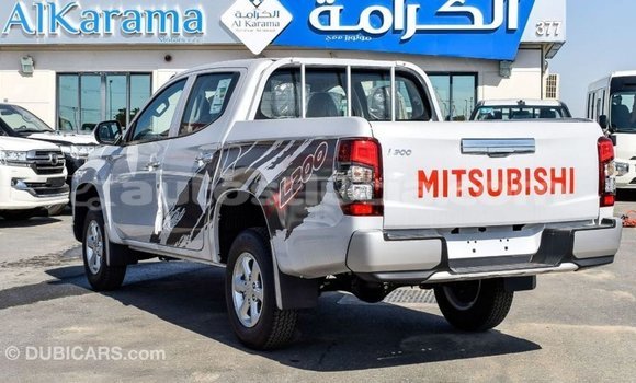 Acheter Import Voiture Mitsubishi L200 Blanc à Import - Dubai, Anse-la-Raye Acheter Import Voiture Mitsubishi L200 Blanc à Import - Dubai, Anse-la-Raye