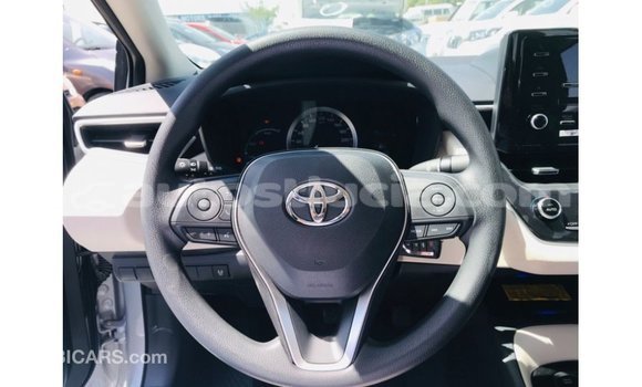Buy Import Toyota Corolla White Car in Import - Dubai in Anse-la-Raye Buy Import Toyota Corolla White Car in Import - Dubai in Anse-la-Raye