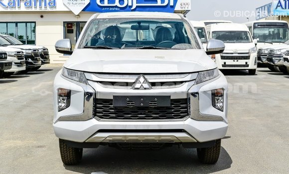 Buy Import Mitsubishi L200 White Car in Import - Dubai in Anse-la-Raye Buy Import Mitsubishi L200 White Car in Import - Dubai in Anse-la-Raye