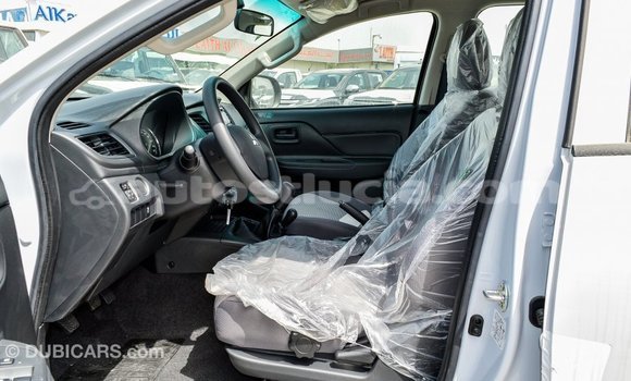 Buy Import Mitsubishi L200 White Car in Import - Dubai in Anse-la-Raye Buy Import Mitsubishi L200 White Car in Import - Dubai in Anse-la-Raye