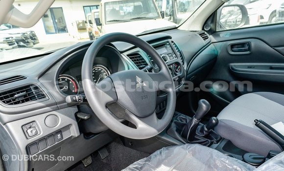 Buy Import Mitsubishi L200 White Car in Import - Dubai in Anse-la-Raye Buy Import Mitsubishi L200 White Car in Import - Dubai in Anse-la-Raye