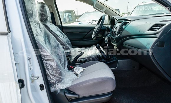 Buy Import Mitsubishi L200 White Car in Import - Dubai in Anse-la-Raye Buy Import Mitsubishi L200 White Car in Import - Dubai in Anse-la-Raye