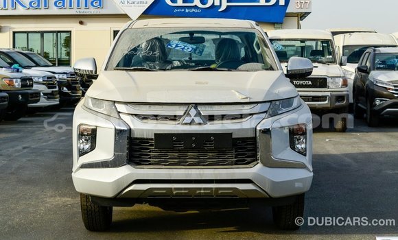 Buy Import Mitsubishi L200 White Car in Import - Dubai in Anse-la-Raye Buy Import Mitsubishi L200 White Car in Import - Dubai in Anse-la-Raye