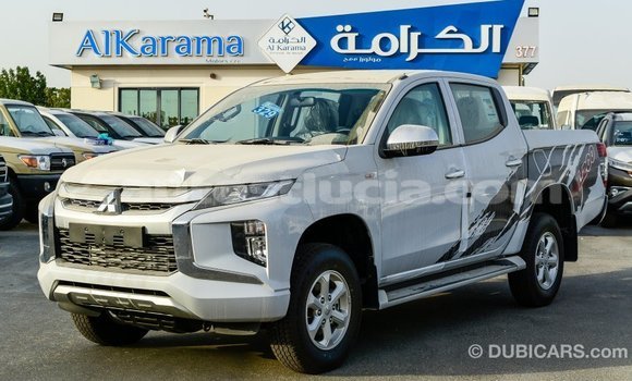 Buy Import Mitsubishi L200 White Car in Import - Dubai in Anse-la-Raye Buy Import Mitsubishi L200 White Car in Import - Dubai in Anse-la-Raye