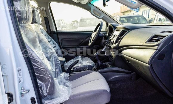 Buy Import Mitsubishi L200 White Car in Import - Dubai in Anse-la-Raye Buy Import Mitsubishi L200 White Car in Import - Dubai in Anse-la-Raye