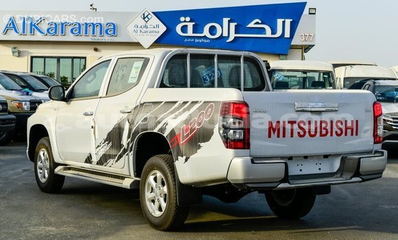 Buy Import Mitsubishi L200 White Car in Import - Dubai in Anse-la-Raye Buy Import Mitsubishi L200 White Car in Import - Dubai in Anse-la-Raye