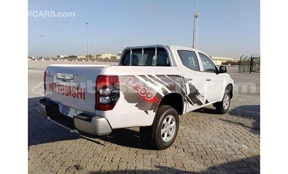 Buy Import Mitsubishi L200 White Car in Import - Dubai in Anse-la-Raye Buy Import Mitsubishi L200 White Car in Import - Dubai in Anse-la-Raye