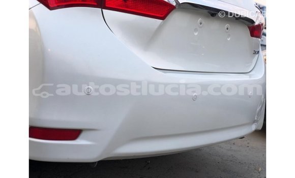 Buy Import Toyota Corolla White Car in Import - Dubai in Anse-la-Raye Buy Import Toyota Corolla White Car in Import - Dubai in Anse-la-Raye