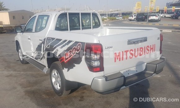 Buy Import Mitsubishi L200 White Car in Import - Dubai in Anse-la-Raye Buy Import Mitsubishi L200 White Car in Import - Dubai in Anse-la-Raye