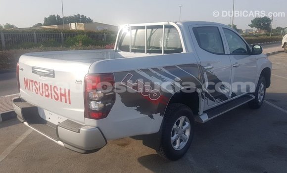 Buy Import Mitsubishi L200 White Car in Import - Dubai in Anse-la-Raye Buy Import Mitsubishi L200 White Car in Import - Dubai in Anse-la-Raye