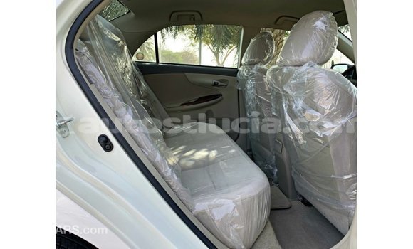 Buy Import Toyota Corolla White Car in Import - Dubai in Anse-la-Raye Buy Import Toyota Corolla White Car in Import - Dubai in Anse-la-Raye