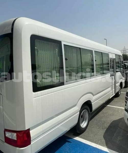 Big with watermark toyota coaster canaries canaries 4516