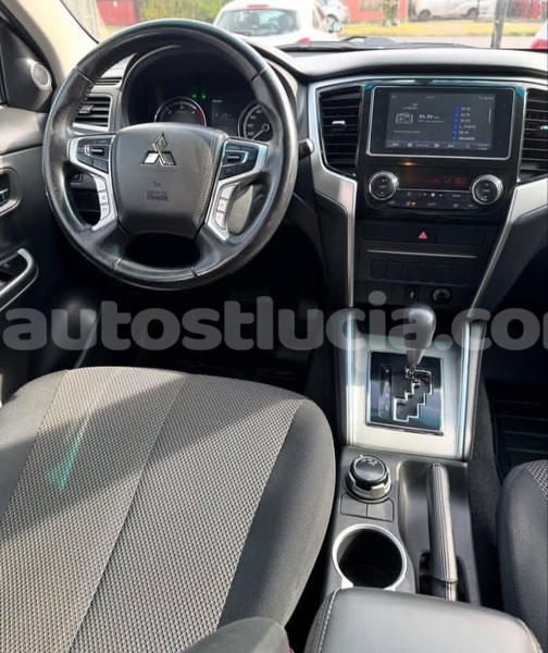 Big with watermark mitsubishi l200 canaries canaries 4535