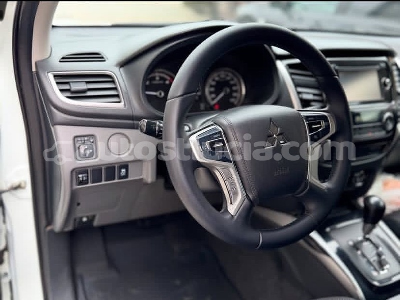 Big with watermark mitsubishi l200 canaries canaries 4546