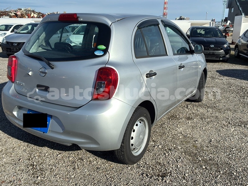 Big with watermark nissan march castries choc 4711