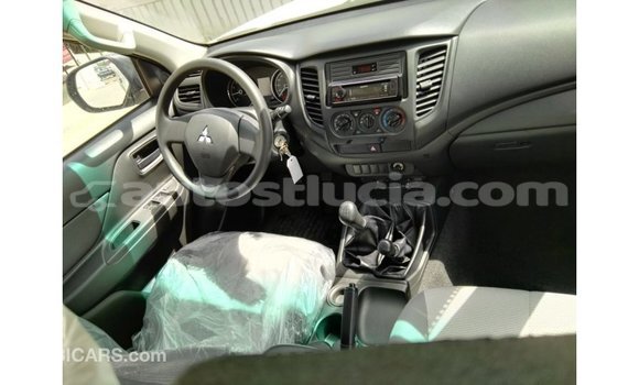 Buy Import Mitsubishi L200 White Car in Import - Dubai in Anse-la-Raye Buy Import Mitsubishi L200 White Car in Import - Dubai in Anse-la-Raye