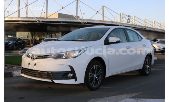 Buy Import Toyota Corolla White Car in Import - Dubai in Anse-la-Raye Buy Import Toyota Corolla White Car in Import - Dubai in Anse-la-Raye