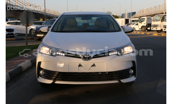 Buy Import Toyota Corolla White Car in Import - Dubai in Anse-la-Raye Buy Import Toyota Corolla White Car in Import - Dubai in Anse-la-Raye