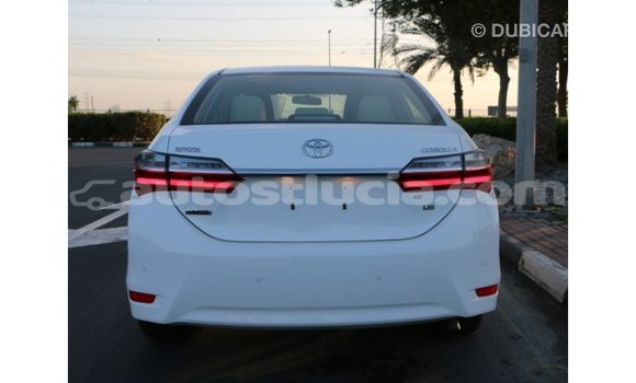 Buy Import Toyota Corolla White Car in Import - Dubai in Anse-la-Raye Buy Import Toyota Corolla White Car in Import - Dubai in Anse-la-Raye